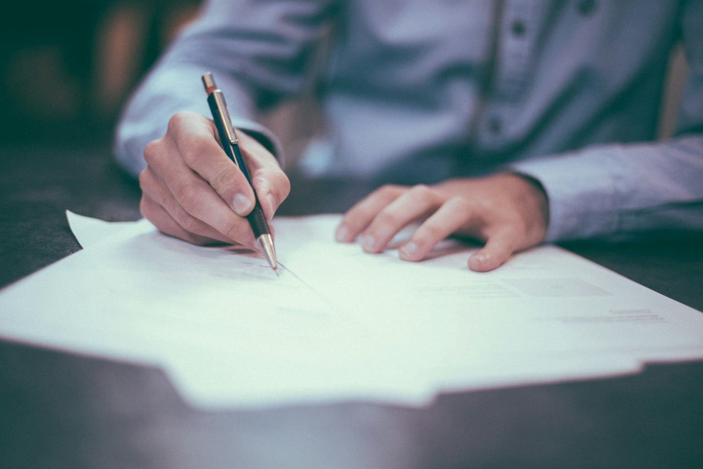 Insurance broker reviewing documents