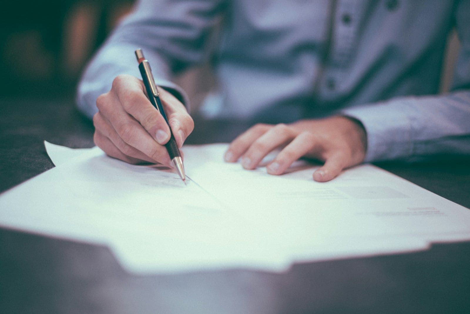 Insurance broker reviewing documents